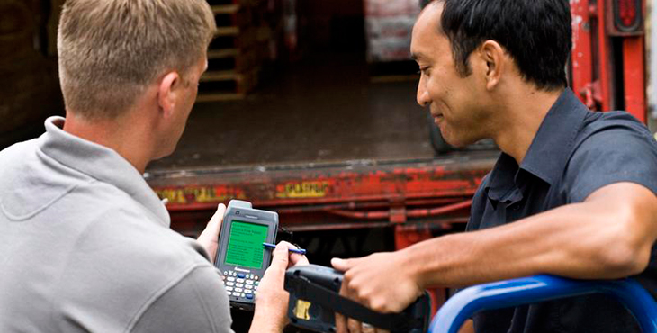 Driver performing van sales operations with the help of jlan mobile technology